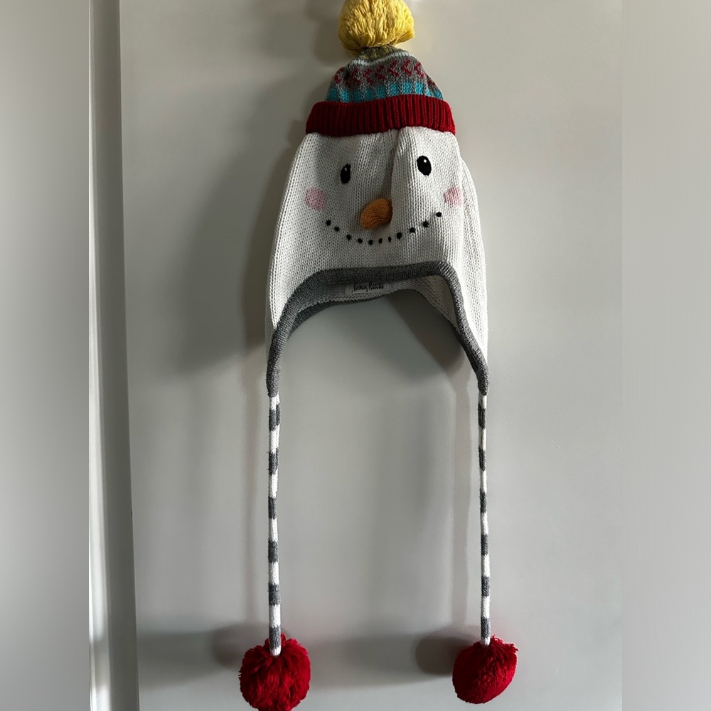 Neiman Marcus knitted snowman hat.  Fit my son at 6 months to a 1 year.